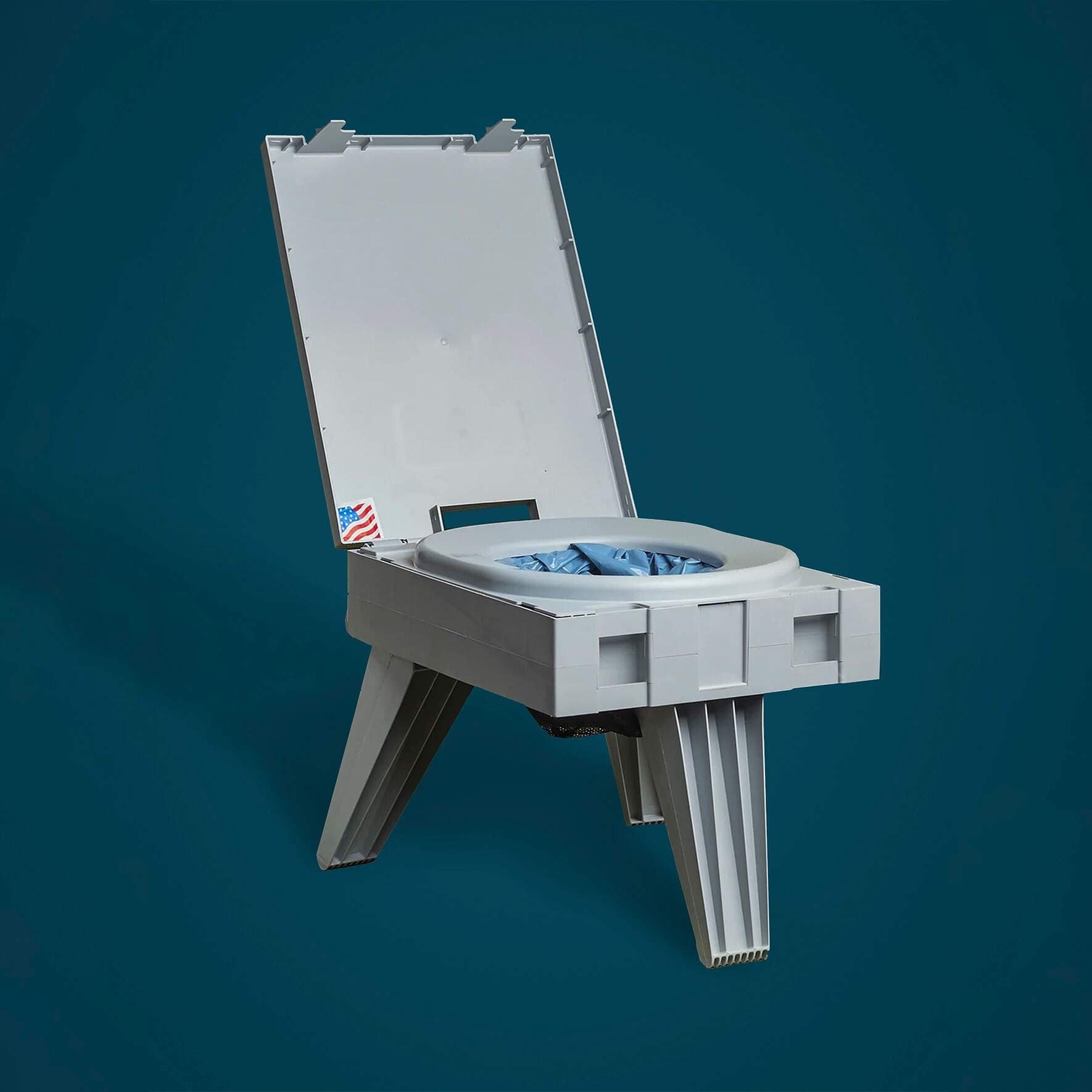 Cleanwaste GO Anywhere portable toilet set up with its lid open